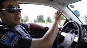 What is Tulsa doing to add more Hispanics to its police department?