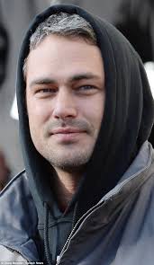 Taylor Kinney takes his Mom to the Thanksgiving Day Parade