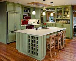Here's a before and after of the main wall of cabinets. How To Reface Your Old Kitchen Cabinets New Hampshire Home Magazine