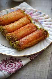 It is quick , can be made a day or two ahead of time and you can play around with the filling and decoration making a new version every time. Znoud El Sit Ladies Fingers Savory Sweetfood Lebanese Desserts Indian Dessert Recipes Food