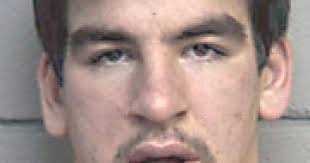 Man charged with kicking officer