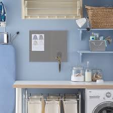 Modern utility room a storage unit with black and white baskets keeps laundry products at bay in this compact utility room, use smaller baskets for utensils and cleaning products, and choose a metallic clothes horse that won't look out of place in a. Utility Room Ideas