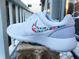 Strikingly similar to the recent tiger camo variation, the nike roshe run print returns in another subdued palette of greyscale palm. as implied, the popular runner is draped with a tropical palm pattern across its woven mesh upper, devoid of any color, for a sleek and subtle finish. Womens Custom Nike Roshe Run Sneakers Floral Design All White With Floral Pattern Womens White Custom Roshe Nike Shoes Nike Shoes Women Nike Free Shoes