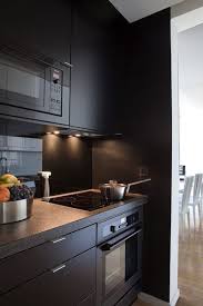 7 Cuisines Noires Qui Vont Vous Faire Aimer Le Noir Cuisine Noire Amenagement Cuisine Cuisines Maison