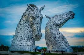The Kelpies Scotland History Art Legend Engineering Meet Scotland Tourist Attractions Scotland History Scotland Road Trip