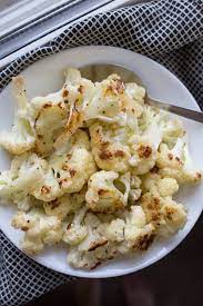 Easy Oven Roasted Cauliflower This Basic Roasted Cauliflower Recipe Is A Tasty Low Car Roasted Cauliflower Recipes Clean Eating Recipes Roasted Cauliflower