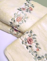 Use bath towels to jazz up a bathroom by picking colors that play off of the walls, fixtures, flooring or existing decorative accents. A Touch Of Lace Towel Embroidery Designs Fancy Towels Hand Embroidery Designs