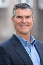 Scott Comstock, Real Estate Agent