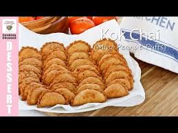 Kok Chai Mini Peanut Puffs Are A Traditional Chinese New Year Snack Prepared To Symbolize Abundant Wealth They Savory Snacks Chinese Dessert Chinese Snacks