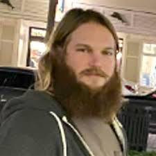 Michigan man charged in threats to congressman, FBI director