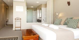 This remodel went from a tiny corner bathroom, to a charming full master bathroom with a large walk in closet. Vue 5 Beach House Small Master Bedroom Modern Bedroom Design Bedroom Design