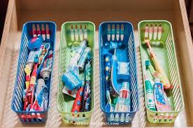 Organizing toothbrushes & toothpaste out of sight. How To Organize Toothbrushes In Your Kid S Bathroom