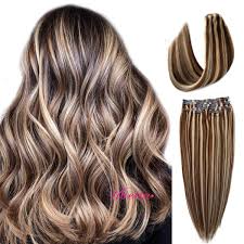 If you're a natural brunette who is trying to go blonde, a single process won't cut it because you always have to lighten or lift your. Amazon Com Clip In Hair Extensions Brown With Blonde Highlights Human Hair Extensions 7 Pieces 100g Skin Weft Remy Clip In Human Hair Extensions Fine Hair Full Head Silky Straight Real Hair