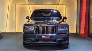 The exterior has been painted bright yellow while the interior has a starlight headliner, first used in the phantom celestial. Alain Class Motors Rolls Royce Cullinan Black Badge
