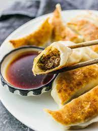 I Love These Homemade Pan Fried Chinese Dumplings Filled With Ground Beef And Sliced Scallions Also Chinese Dumplings Dumpling Recipe Dumplings Recipe Chinese