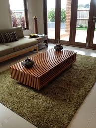 20 Stunning Centre Table Ideas For Modern Living Rooms Centre Table Living Room Center Table Living Room Living Room Table