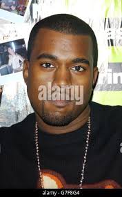 Hip Hop artist Kanye West, center, stands with BMI President Dell Bryant,  right, and Rihanna as he receives Billboard awards at the 6th Annual BMI  Urban Awards, Wednesday, Aug. 30, 2006 at