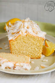 Saftiger Kokos Zitronen Kuchen Mit Zitronenschale Kokosmilch Und Kokosnuss Rezepte Kokosmilc Lemon Cake Recipe Vegan Lemon Cake Fruity Cupcakes