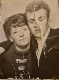 Hi can anyone make this photo better by taking out the rip please. No other  alterations to faces please? Mum and dad's 60th Wedding Anniversary soon.  Thanks