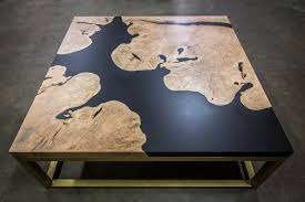 Coffee Table Made Of Maple Wood And Epoxy Resin That Has Been Tinted Black The Base Is Made Of Brass Nuge Woo Wood Resin Table Epoxy Resin Wood Resin Table