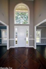 Love The Floor And The Arched Window In A Two Story Foyer New Homes Arched Windows House Exterior