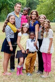 Divide your child's hair into different sections. Mcknight Family Pictures