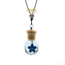 Keistimewaan fleur untuk perkongsian semua : China Blue Flower Pendant 8ml Flat Round Glass Car Perfume Bottle With Wood Cap China Flat Round Perfume Bottle Glass Bottle