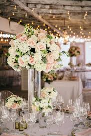 Our silk flowers bulk prices start at $1.99 per stem. Wedding Centerpieces Glass Vase Tall Centrepieces With Stunning Flowers Elegant Wedding Centerpiece Wedding Centerpieces Tall Centerpieces