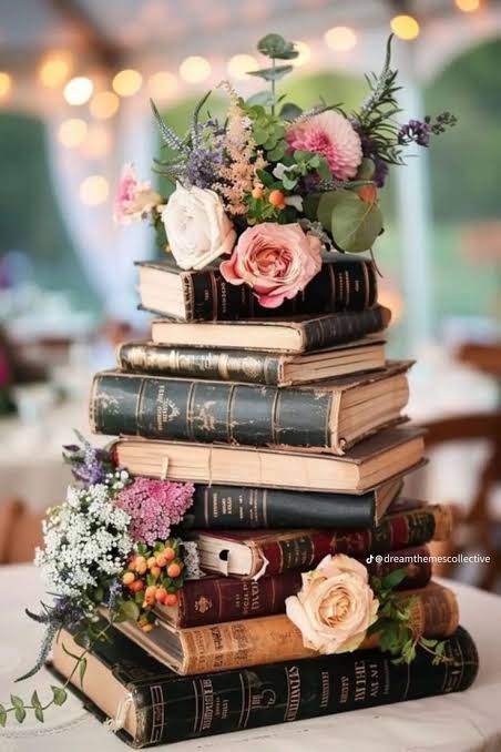 The Voice of My Soul | Book themed wedding centerpieces, Book-themed centerpiece ideas, Floral arrangements