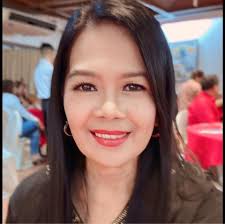 The St. La Salle Hall is illuminated in green and maroon to highlight the  partnership of De La Salle University and University of the Philippines for  social entrepreneurship and service learning. DLSU