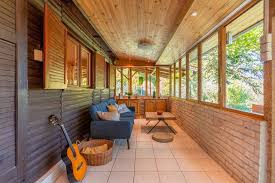 The neighboring hallway's flagstone floor blends seamlessly with the natural hardwood floors of the living and dining space. Modern Forest Home With Sauna Ac And View To Danube Nagymaros Updated 2021 Prices