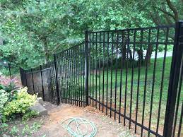 Next, insert the gate into the opening, at the desired height. Aluminum Fencing Add A Link Fence Company Nj Fence Contractor