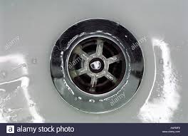 a plug hole on a bathroom sink for