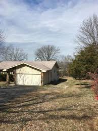 Located 1 2 Mile From The Boat Ramp This 3 Bed 1 Bath Home Nestled In The Mark Twain National Forest On 1 Ac Rock Fireplaces Kitchen Dining Combo House Styles