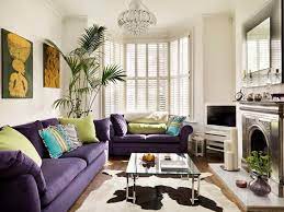 Living Room Furniture Ideas White Tv Tv Stand Cowhide Rug Purple Couch Fireplace Glass Chandelier Purple Living Room Cute Living Room Small Living Room Layout
