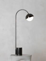 Intelligent and highly efficient, contour's minimalist design has been refined to the bare essentials, creating a rich interior space for your personal. Contour Table Lamp