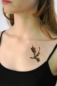 Small game of thrones dracarys mother of dragons minimalist tattoo design tattoo dimensions: 13 Game Of Thrones Temporary Tattoos You Need On Your Body Elegant Tattoos Flying Tattoo Small Dragon Tattoos