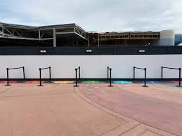 The paint by number mural this year is a beautiful image of the imagination pavilion, complete with a rainbow going across the building. Photos Socially Distanced Expression Section Paint By Number Mural Set Up For Taste Of Epcot International Festival Of The Arts 2021 Wdw News Today