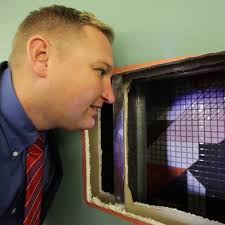 Convention center re-do to reveal hidden Harper mural