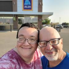 Aldi care package with goodies and a candle