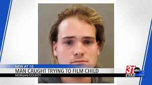 Hartselle Police arrest man for trying to photograph child using Walmart  bathroom