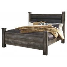 Use it to store bedroom essentials or any other household objects. Ashley Rowley Creek King Poster Bed