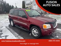 Image result for Medium Red 2002 Envoy