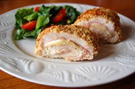 Wrap the chicken in the plastic wrap, twist the excess plastic, and roll the chicken while twisting the sides in to tighten and firm up the roll of chicken cordon bleu. Maple Leaf Times Chicken Cordon Bleu