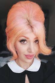 One of the most popular hairdos half a century ago is called the beehive hairstyle. Beehive Hair Impressive Trend Straight From The 60s Glaminati Com