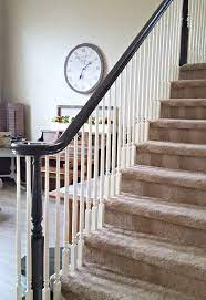 Staircase Refinishing The Easy Way And For Under 50 Refinish Staircase Diy Staircase Makeover Stair Railing Makeover