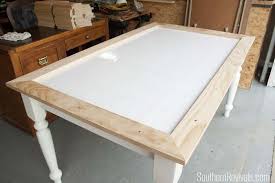 Find the perfect home furnishings at hayneedle, where you can buy online while you explore our room designs and curated looks for tips, ideas & inspiration to help you along the way. Tile Top Table Makeover Updating A Tile Top Table With Wood Part 1 Southern Revivals Diy Table Top Tile Top Table Makeover Kitchen Table Redo