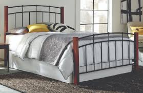 Bold metal borders the headboard, along with small, round grooved details to contrast beautifully. Wood Metal Headboards Brunswick Mattress Warehouse