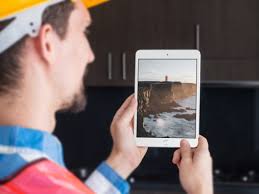 Download Free Man Holding Ipad Mini Mockup Generator Mockup Free Downloads