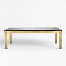 Hexagon base holds a light brownish gray mirror. Brass Coffee Tables Crate And Barrel